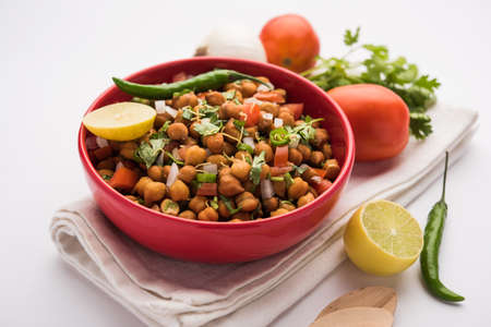 Black Chickpea Chaat or Kala Chana Chat recipe is a popular snack recipe from India, served in a bowl. selective focusの写真素材