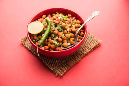 Black Chickpea Chaat or Kala Chana Chat recipe is a popular snack recipe from India, served in a bowl. selective focusの写真素材