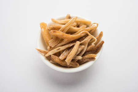 Ayurvedic Potent herb musli - also known as Safed MoosliÂ or Swetha Musli in powder and Raw formの写真素材