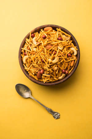 Aloo Chivda or Potato Chiwda also known as Falahari Namkeen for Vrat.Â  Traditional Fasting snack recipe from India, garnished with Cashew Nuts and Almondsの写真素材