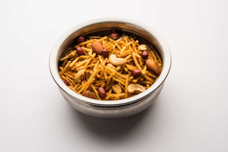 Aloo Chivda or Potato Chiwda also known as Falahari Namkeen for Vrat.Â  Traditional Fasting snack recipe from India, garnished with Cashew Nuts and Almondsの写真素材