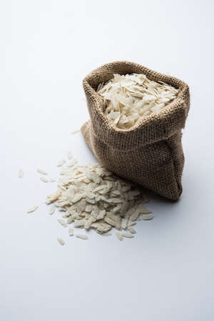 Raw Flattened Rice or Thick or thin Rice Flakes for Namkeen Chivda snacks or Aloo Poha for Indian...