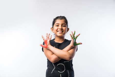 Cute Little Girl Showing Painted Hand or Colourful Palmの写真素材