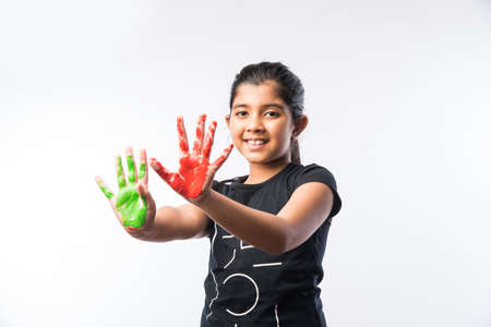 Cute Little Girl Showing Painted Hand or Colourful Palmの写真素材