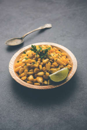 Spicy Masala Sweet Corn is a tasty roadside Indian snack, which is very easy to make. selective focusの写真素材