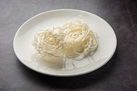 Kurdai or Kurdayi or Kurdayee is a fried dish made using wheat / gehu. selective focus