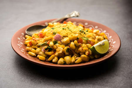 Indian Sweet Corn Chat or Chat is an easy to make snack recipe, served in a bowl or Plate. Selective focusの写真素材