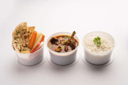 Online Food Delivery - Mutton OR Gosht Masala OR indian lamb rogan josh in a plastic containar ready for pickupの写真素材