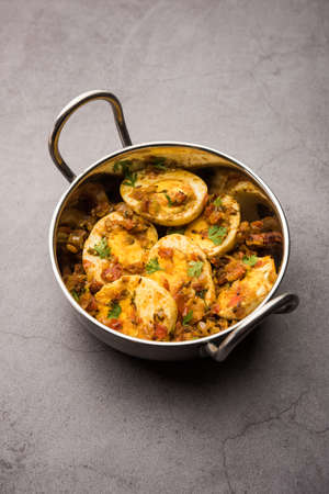 Masala Egg Tawa Fry or ande ki sabzi, served in a plate. selective focusの写真素材