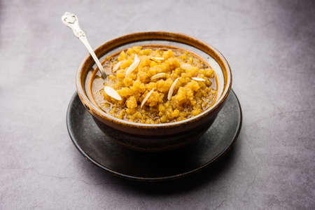 Moong dal halwa is a classic Indian sweet dish made with moong lentils, sugar, ghee and cardamom powderの写真素材