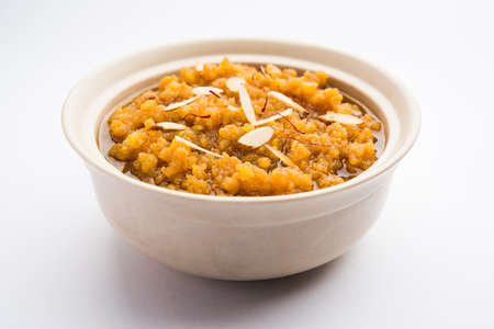 Moong dal halwa is a classic Indian sweet dish made with moong lentils, sugar, ghee and cardamom powderの写真素材