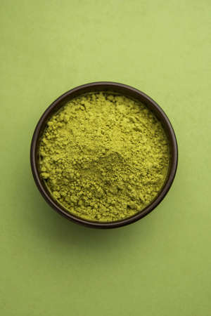 Herbal henna or Mehandi powder in a bowl forming heap, Used for Tattoo or Hair Dye in Indiaの写真素材