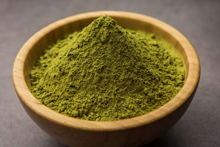 Herbal henna or Mehandi powder in a bowl forming heap, Used for Tattoo or Hair Dye in Indiaの写真素材