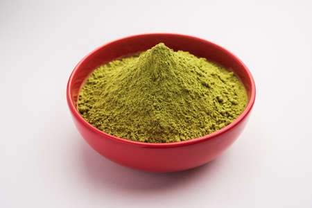 Herbal henna or Mehandi powder in a bowl forming heap, Used for Tattoo or Hair Dye in Indiaの写真素材