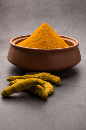 Organic Dry turmeric or Haldi powder also known as curcuma longa linn, selective focusの写真素材
