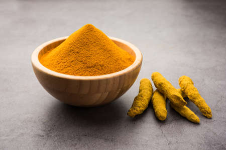 Organic Dry turmeric or Haldi powder also known as curcuma longa linn, selective focusの写真素材