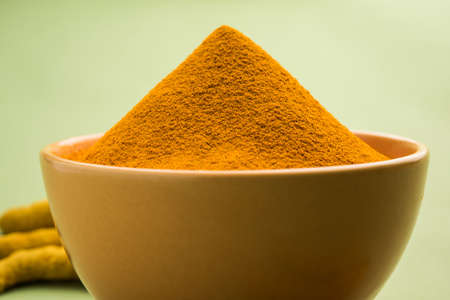 Organic Dry turmeric or Haldi powder also known as curcuma longa linn, selective focusの写真素材