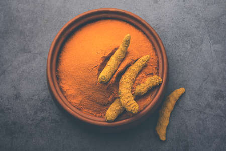 Organic Dry turmeric or Haldi powder also known as curcuma longa linn, selective focusの写真素材