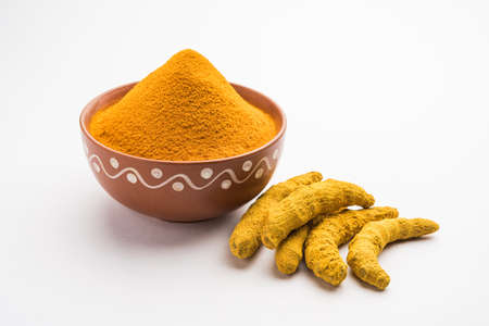 Organic Dry turmeric or Haldi powder also known as curcuma longa linn, selective focusの写真素材