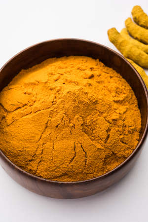 Organic Dry turmeric or Haldi powder also known as curcuma longa linn, selective focus