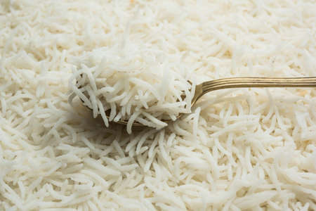 Long Basmati Rice in cooked form is an Indian main course food, served in a bowl. selective focusの写真素材