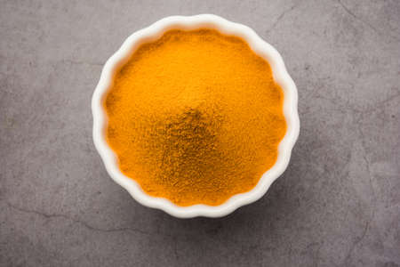 Organic Dry turmeric or Haldi powder also known as curcuma longa linn, selective focus