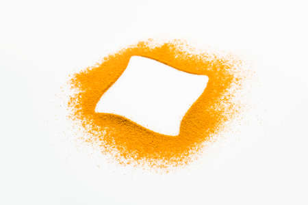 Haldi or Turmeric Powder Ring on the white background, selective focus