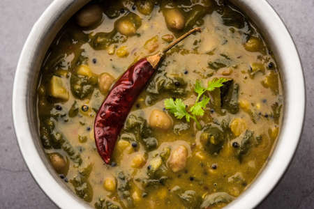 Healthy Dal Palak or yellow Toor Spinach DaalÂ recipe also known as Patal Bhaji in India, served in a bowlの写真素材