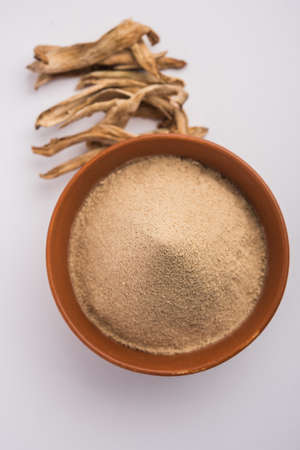 dry mango powder also known as Amchoor or Amchur, it's an Indian Spice with dried fruitの写真素材