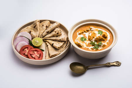 Tasty butter chicken curry or Murg Makhanwala or masala dish from Indian cuisineの写真素材