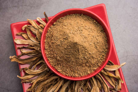 dry mango powder also known as Amchoor or Amchur, it's an Indian Spice with dried fruitの写真素材