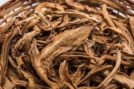 Sun-dried unripe green mango or kairi fruit is an indian dried spice used in Indian curries