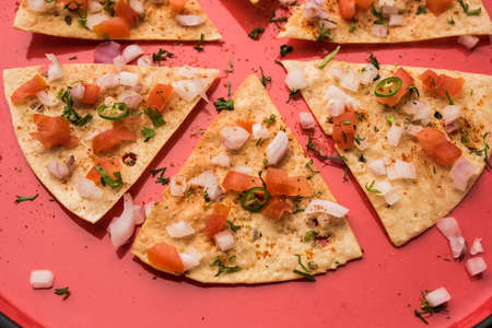 Masala Papad orÂ papadumÂ is a delicious Indian snack made using roasted or fried papad topped...