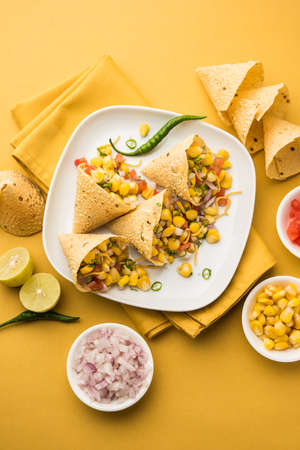 Corn chat / chaat in papad cone, popular indian starter menuの写真素材