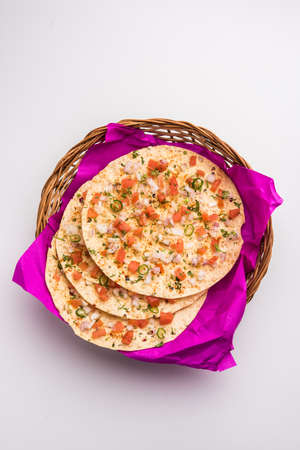 Masala Papad orÂ papadumÂ is a delicious Indian snack made using roasted or fried papad topped...