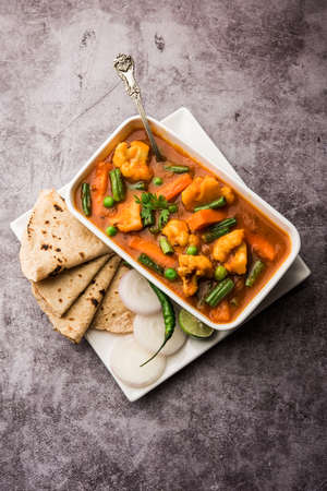 Mix Vegetable greavy recipe in a bowl, Indian restaurant style veg recipe served with Chapatiの写真素材
