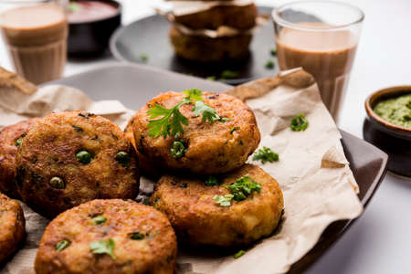 Aloo tikkiÂ orÂ Potato Cutlet or Patties is a popular Indian street food made with boiled...