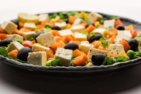 Paneer Vegetable Salad Recipe is a low carb diet food from India using Cottage cheese cubes with...