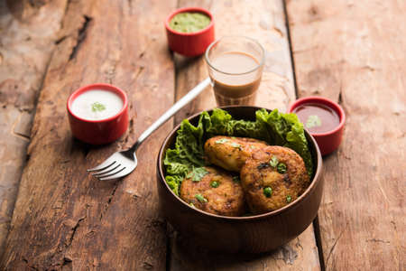Aloo tikkiÂ orÂ Potato Cutlet or Patties is a popular Indian street food made with boiled...
