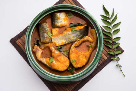 Spicy Fish Curry - kerala, konkan, bengal, goa style in Red and brown colour, served with rice