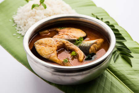 Spicy Fish Curry - kerala, konkan, bengal, goa style in Red and brown colour, served with rice
