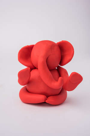 Homemade Lord Ganesha idol for Ganesh Chaturthi Festival using colourful clay or play dough