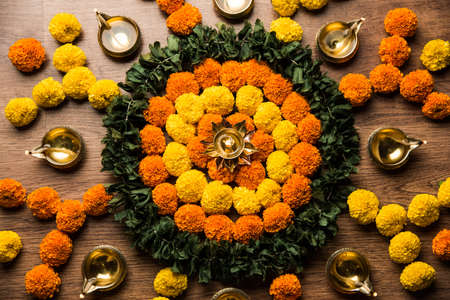 Flower Rangoli for Diwali or Pongal Festival made using Marigold or Zendu flowers and Rose petals...