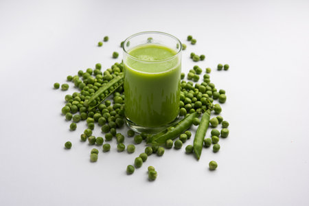 Green Peas Fresh Juice or smoothie or drink made using watana or vatana, Indian healthy green beverage served in a glassの写真素材