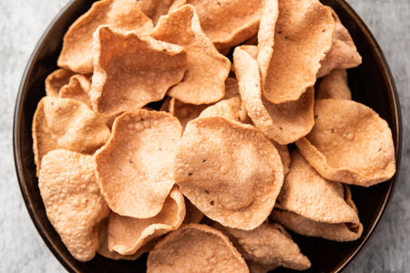 Ragi or Nachni papad or Fryums made using Nagali, it is a crispy and spicy poppadom made from nachaniの写真素材