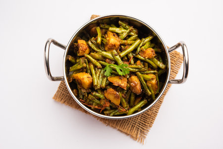 Indian style Chawli Aloo subjiÂ or sabzi, long bean and potato dry fry, served in a bowl, selective focusの写真素材