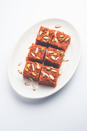 Gajar Halwa Barfi or Carrot pudding barfee is a popular Indian sweet dishの写真素材