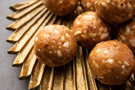 indian sweet groundnut ladoo or mungfali or peanut laddo or laddu made using roasted peanuts and jaggeryの写真素材