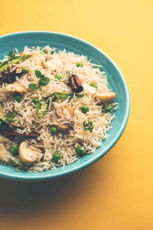 Mushroom Rice or PulavÂ or Pulao or Biryani served in a bowl or plate, selective focusの写真素材