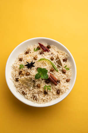Chana Pulao or Pulav or pilaf cooked with Basmati Rice and chickpeas with spices